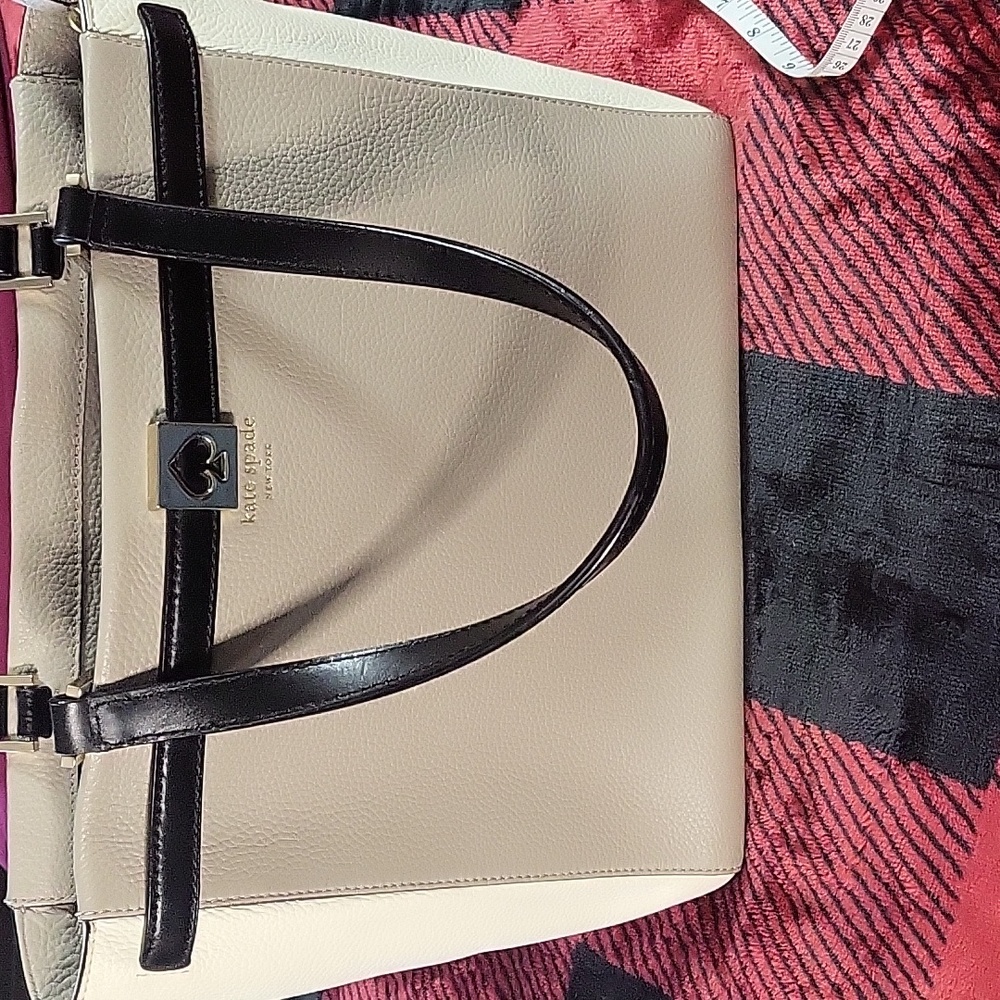 Kate spade taupe cream and black zipper top leather handbag